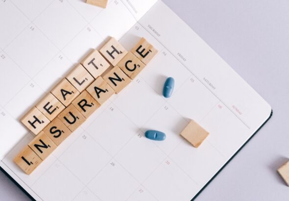 MoHRE health insurance